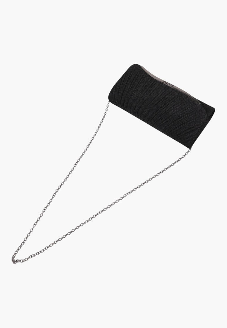 Side view of the black clutch bag featuring smooth fabric and chain strap.