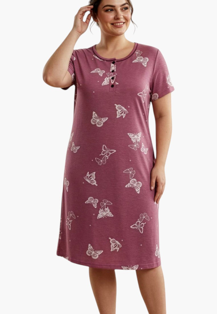 Lifestyle shot of a floral dress with purple and white colors, featuring short sleeves and a round neckline.