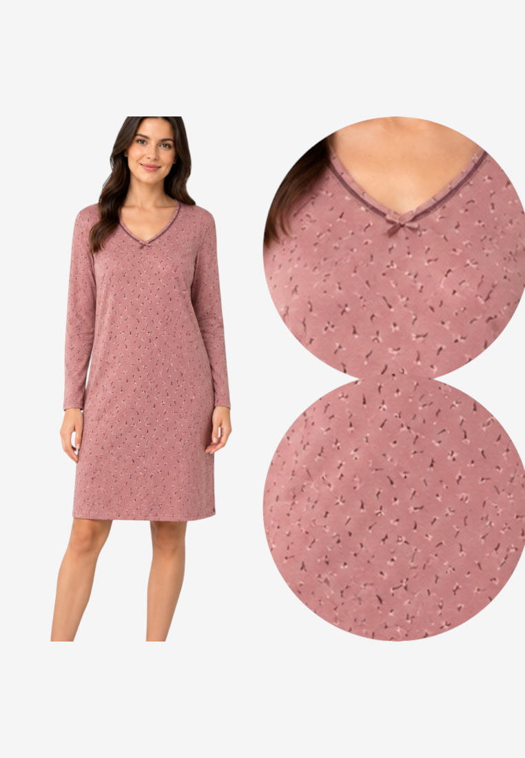 Detail of the pink dress with v-neck and long sleeves on a white background.