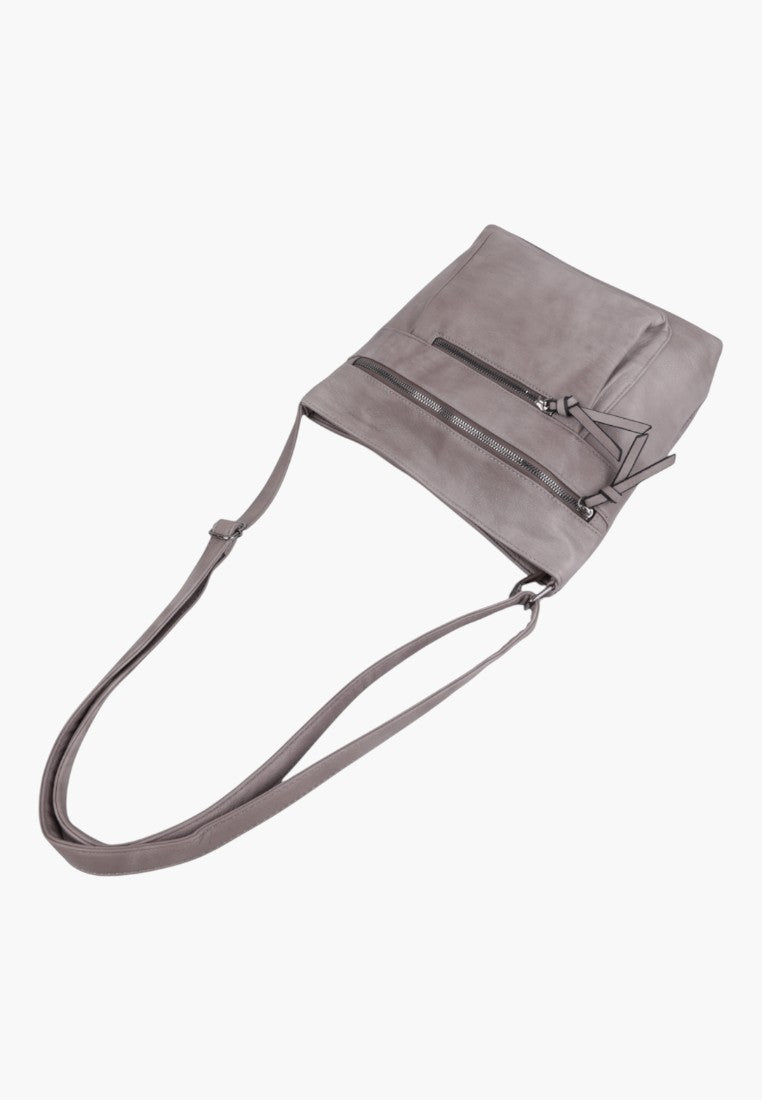 Back view of a light grey faux leather crossbody bag with an adjustable strap.