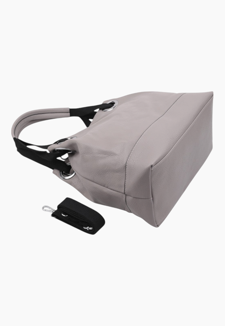Front view of the gray handbag with a side pocket and soft texture.