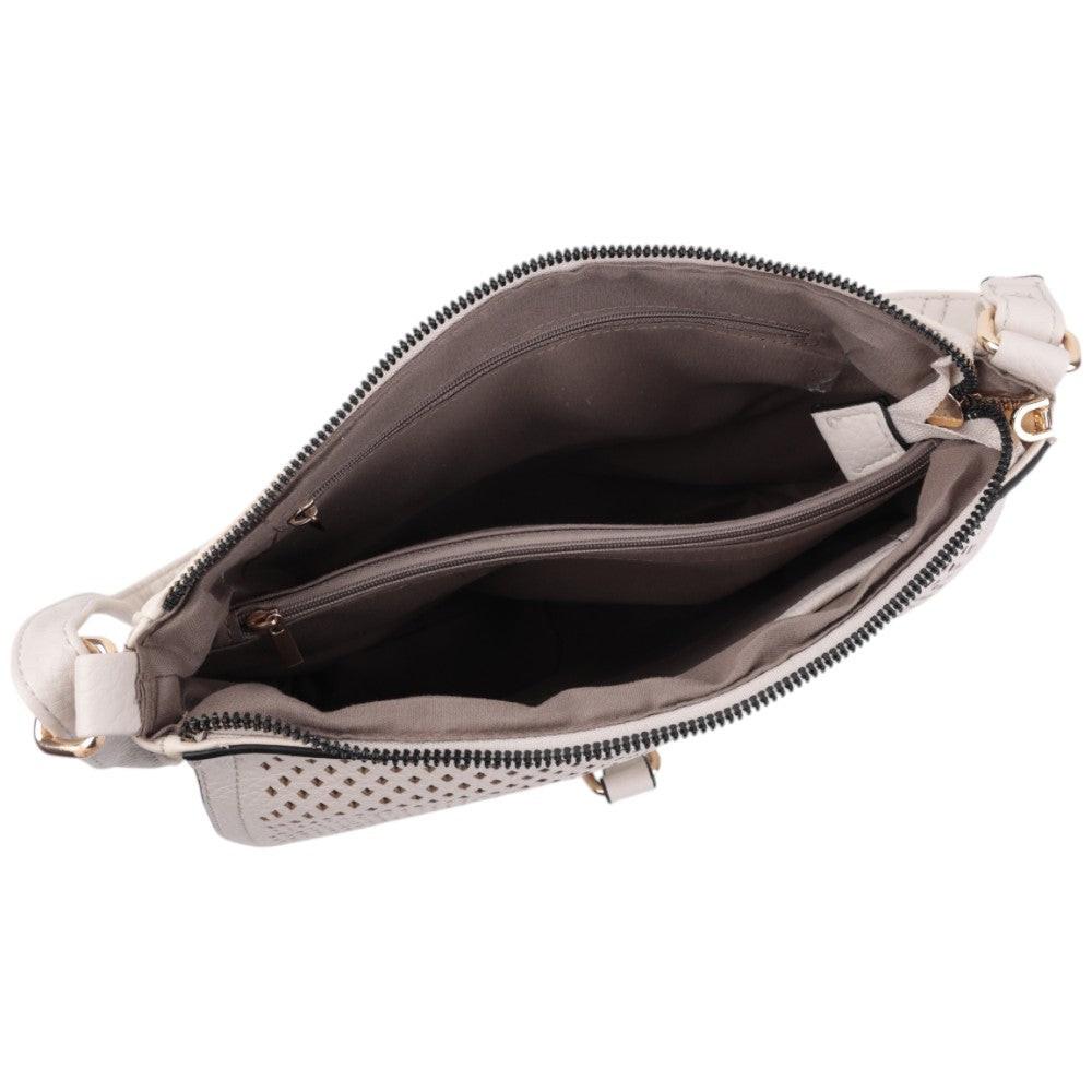 Side view of a beige handbag showcasing mesh design and flap closure on a white background.