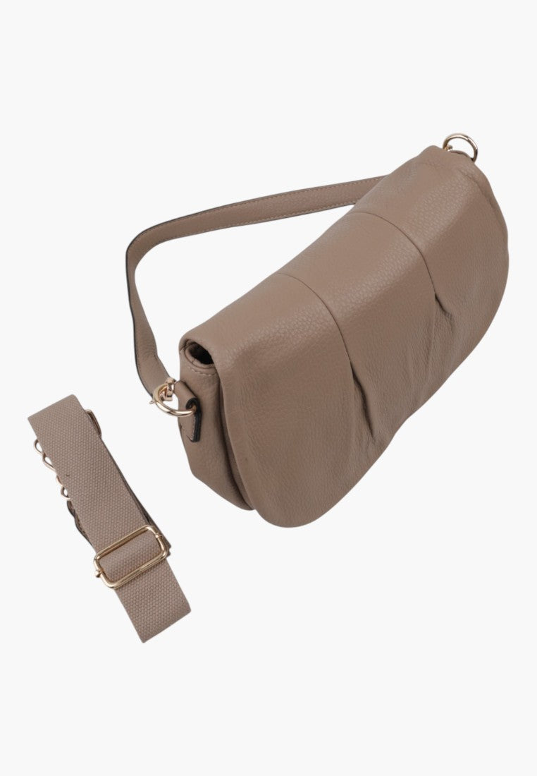 Detail view of the brown handbag showing flat design and detachable strap on a white background.