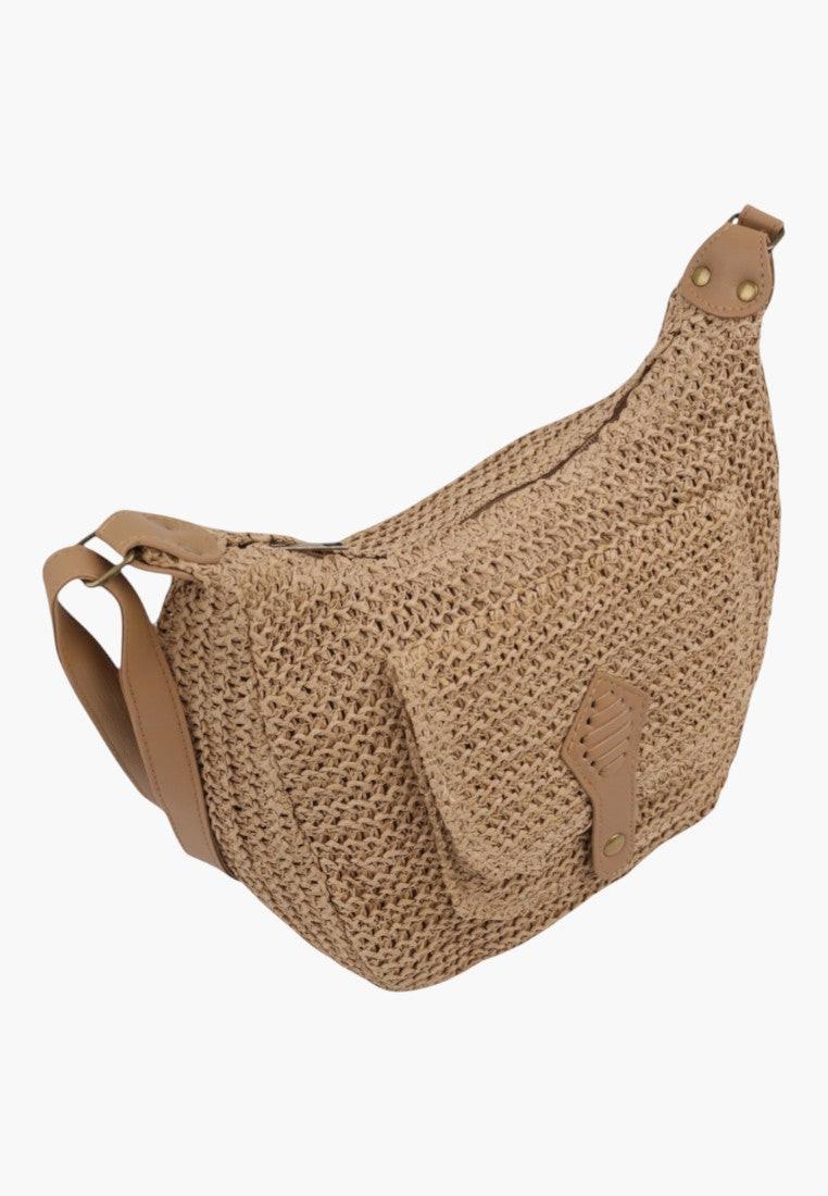 Back view of the brown shoulder bag featuring two pockets and an adjustable strap.