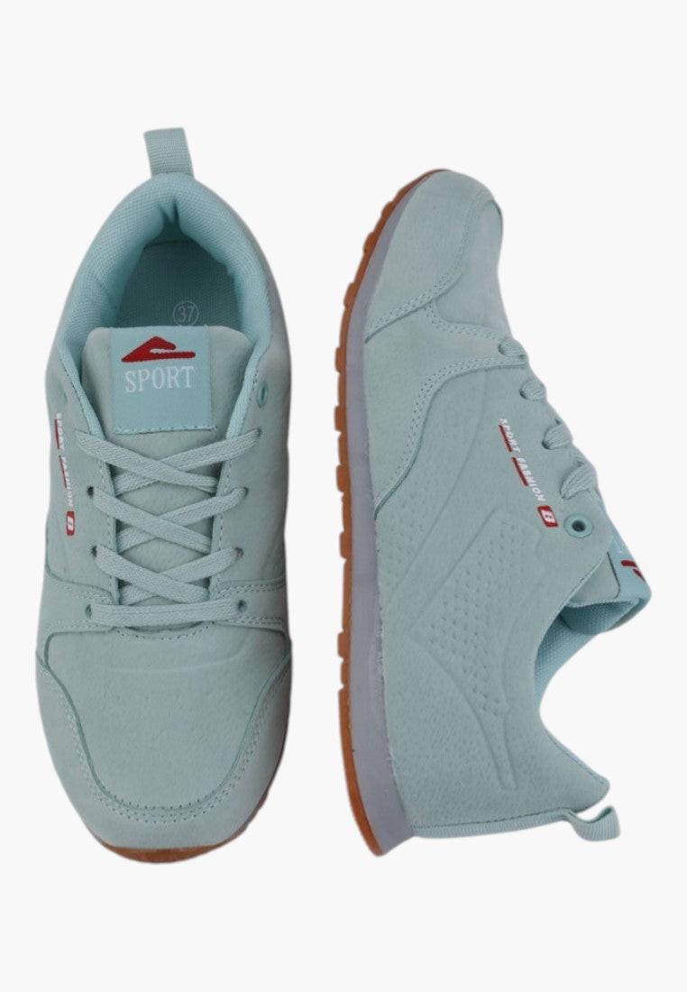 Miętowe sportowe buty damskie, detal, elastyczny design.