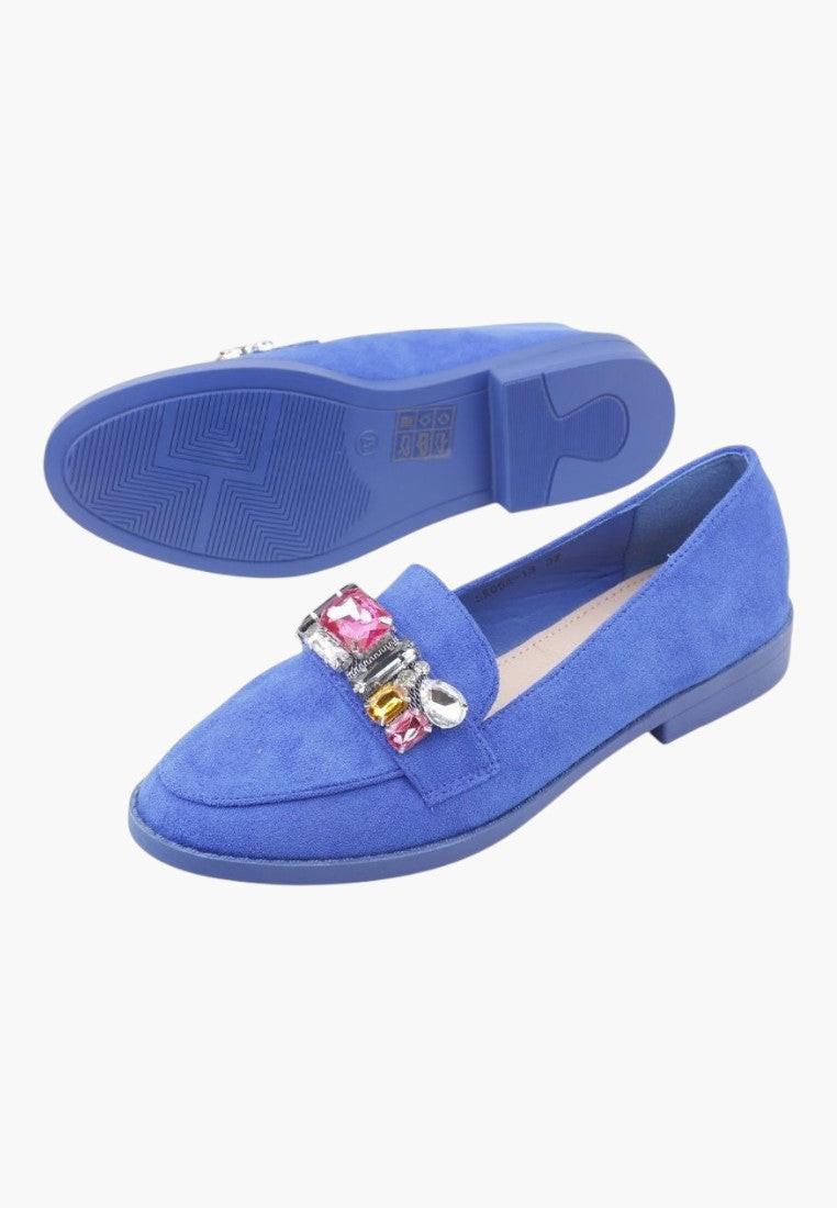 Side view of blue moccasin shoes with a decorative bow accent.