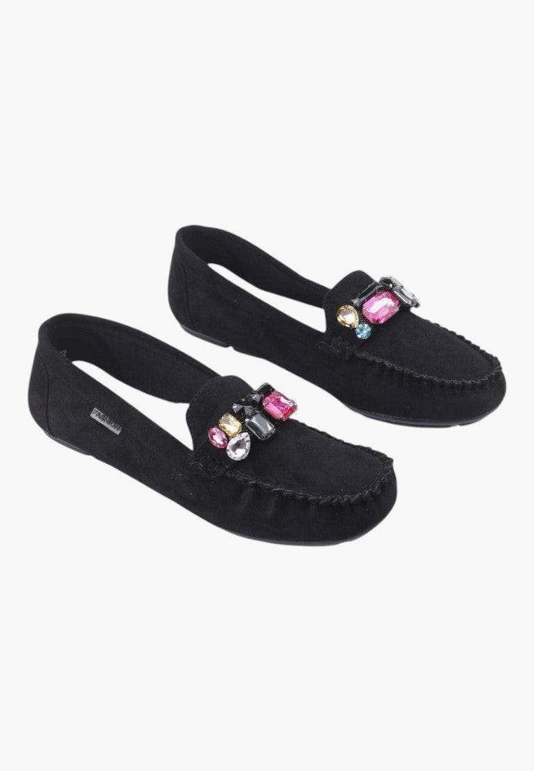 Front view of black suede women's moccasins with decorative details.