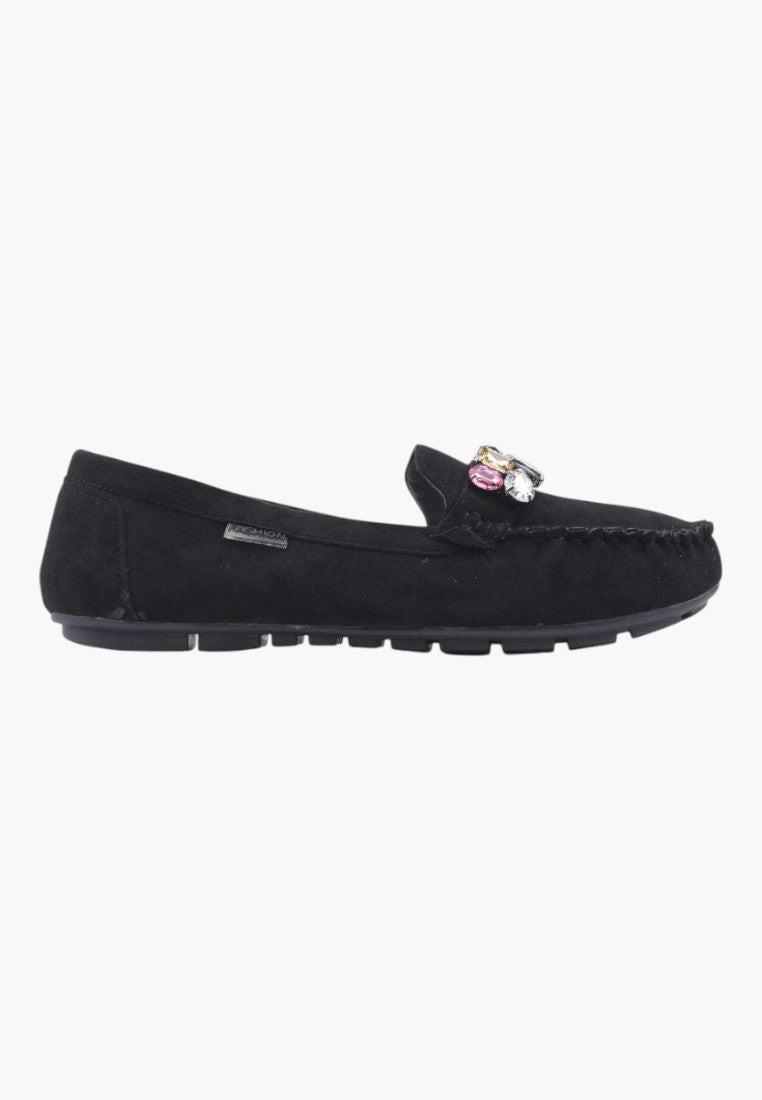 Side view of black slip-on women's moccasins with a flat design.