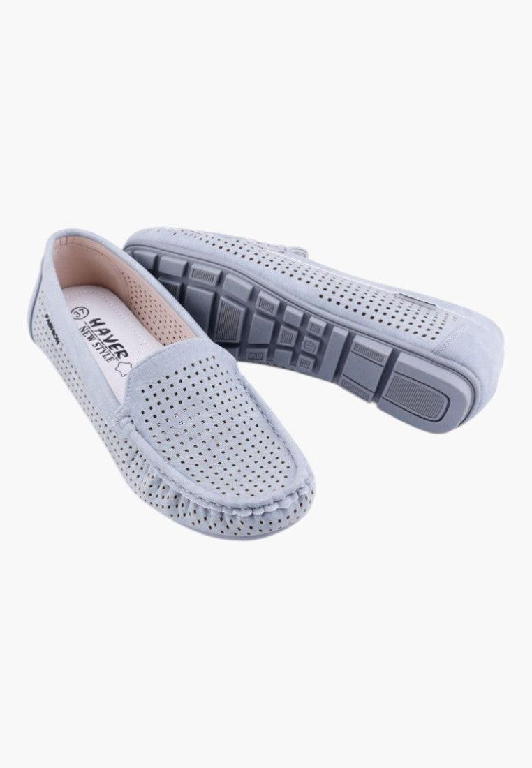 Side view of gray slip-on shoes with low profile and casual style.