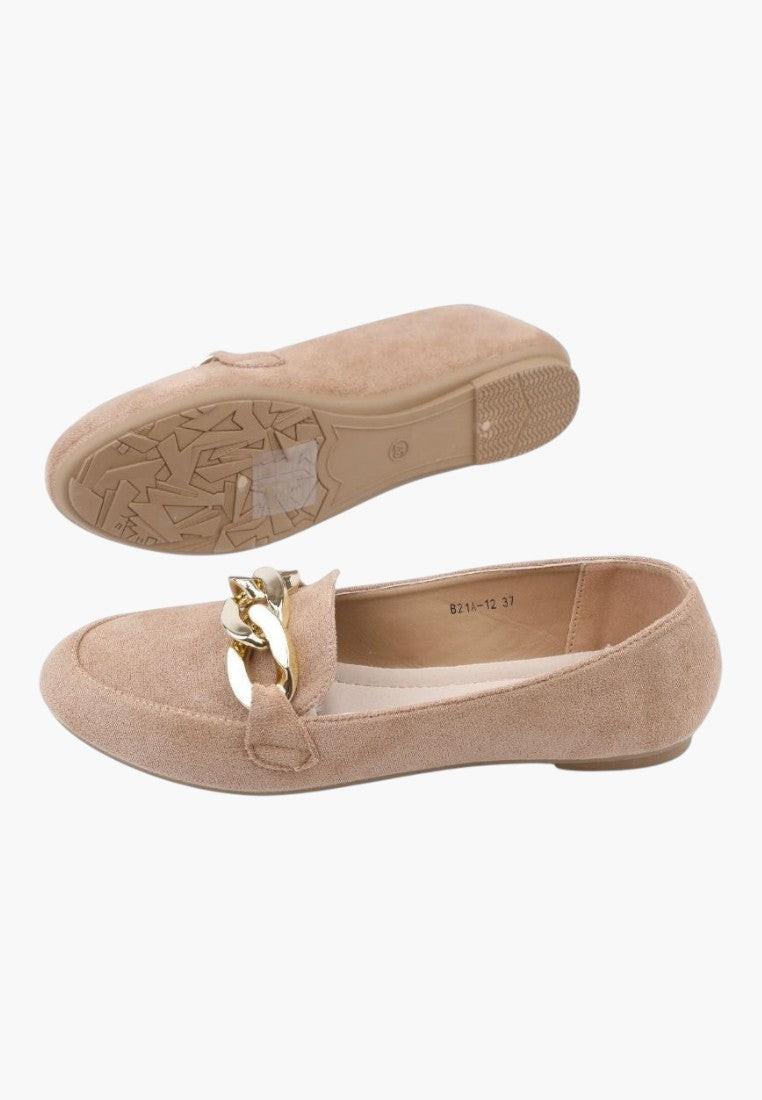 Front view of beige loafers with flat sole and gold buckle