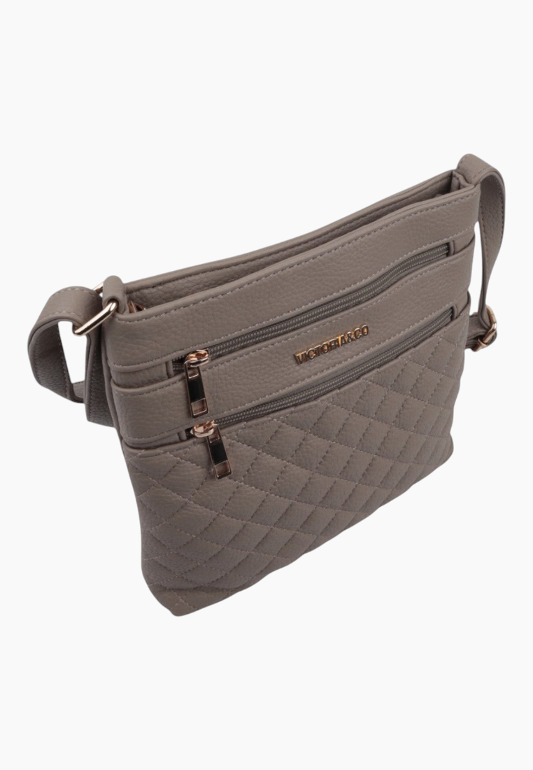 Front view of the brown crossbody bag featuring two zippered pockets and gold hardware.