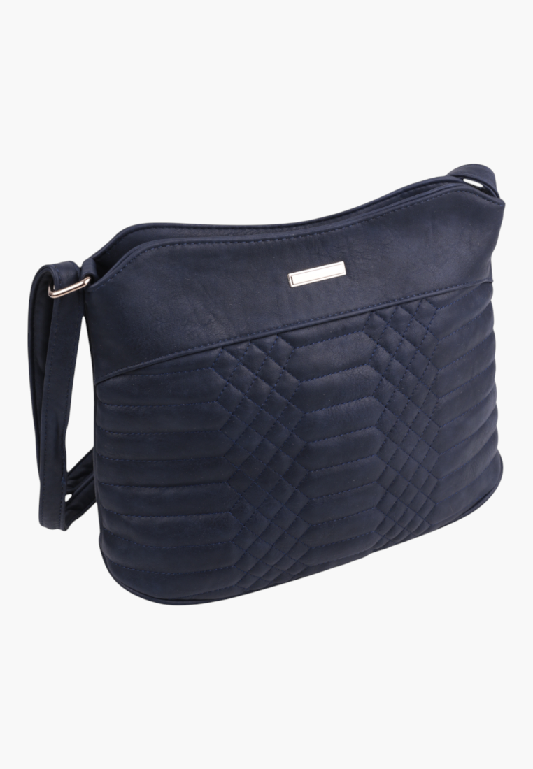 Back view of navy crossbody bag featuring zipper closure and quilted texture.