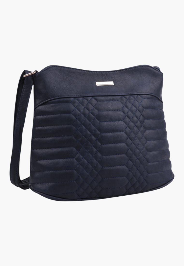 Detail of navy blue faux leather crossbody bag with quilted texture on a white background.