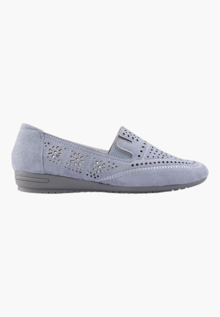 Detail close-up of blue perforated moccasins with elastic sides.