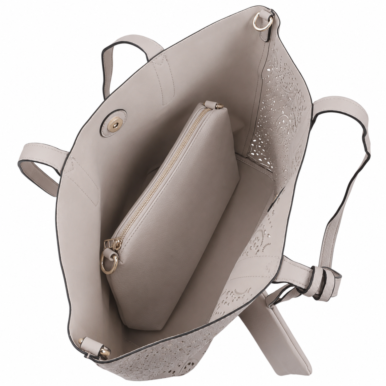 Detail shot of the beige handbag interior with two compartments and a snap closure.