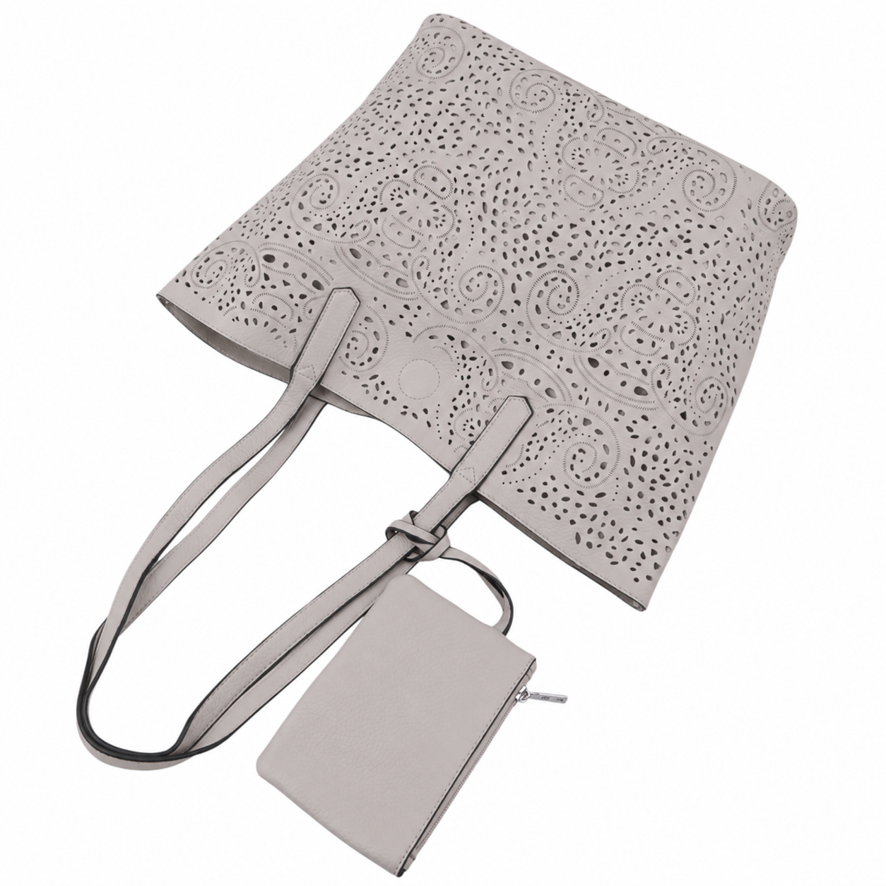Lifestyle shot of a light gray tote bag featuring an embossed pattern and detachable tag.