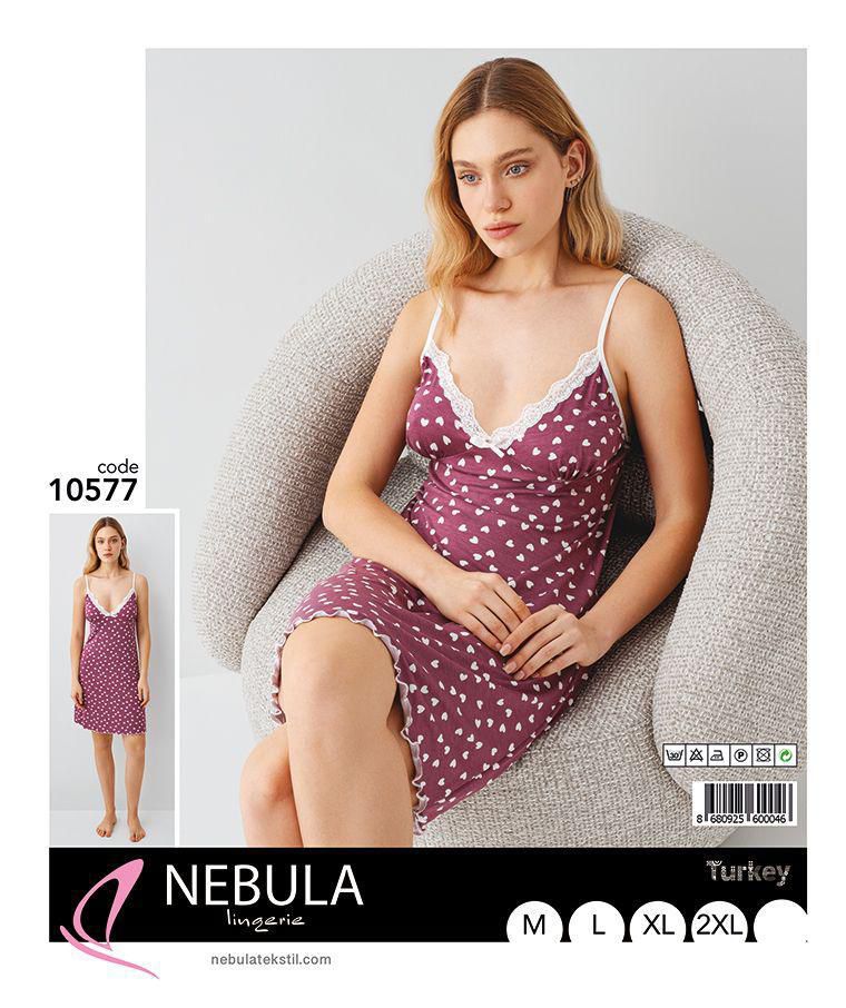 Packaging of the koszula nocna with model display and brand logo on a pink and black background.