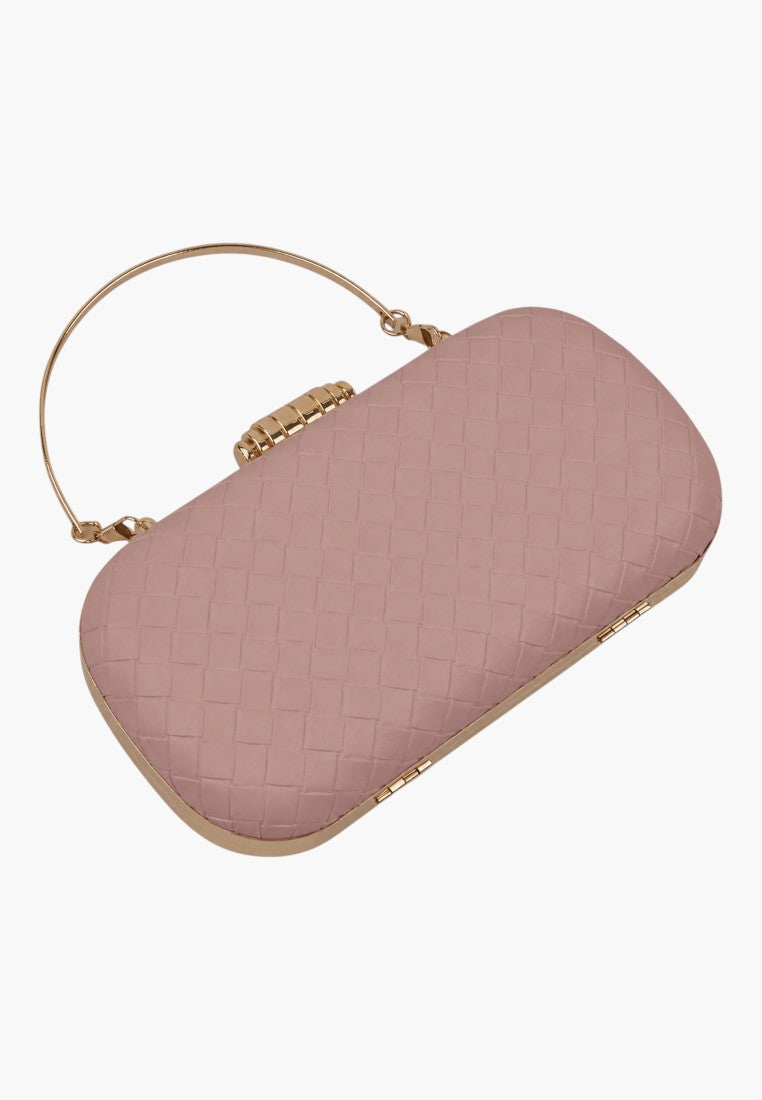 Close-up detail of a pink clutch bag highlighting gold accents and rounded shape on a white background.