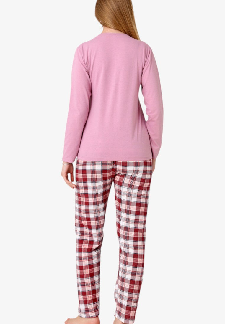 Back view of women's insulated cotton pajama set featuring pink top and red plaid trousers.