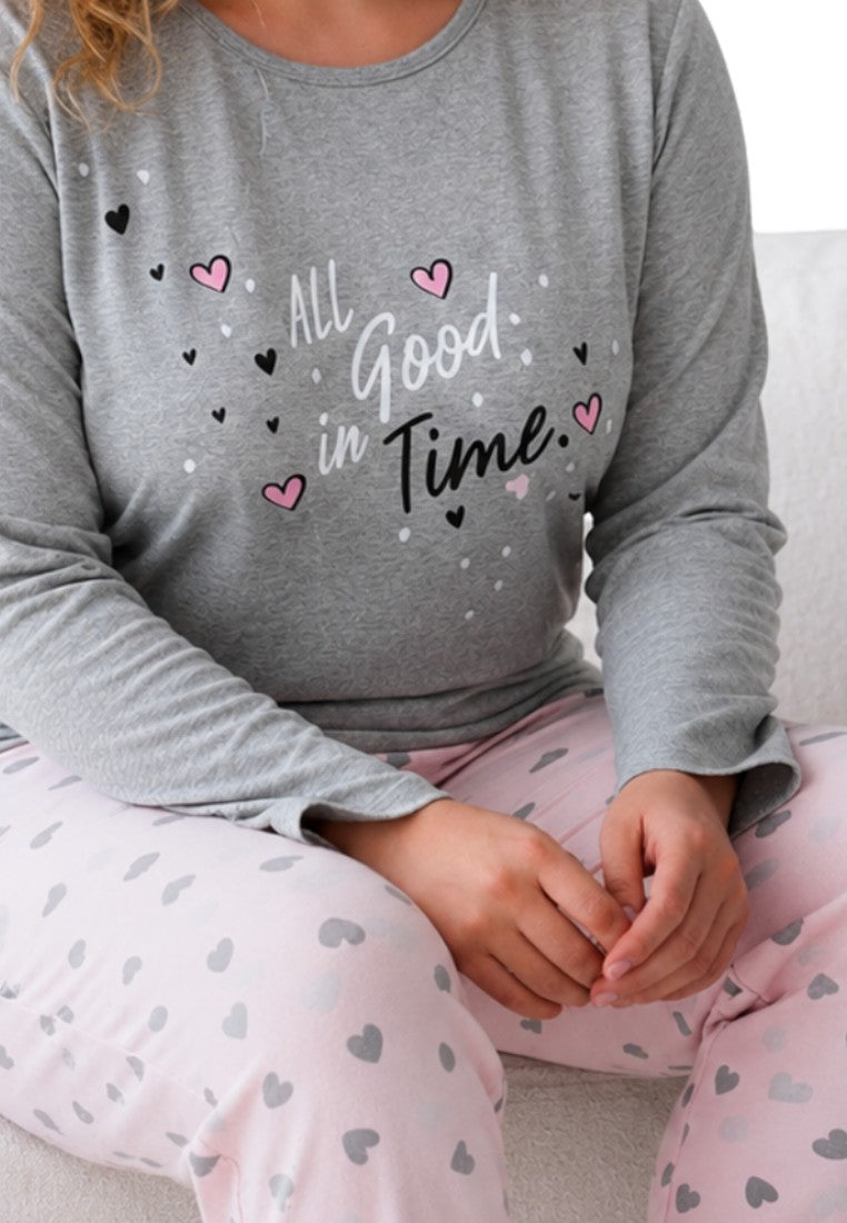 Detail shot of a grey long-sleeve top with heart print and 'All Good in Time' text.