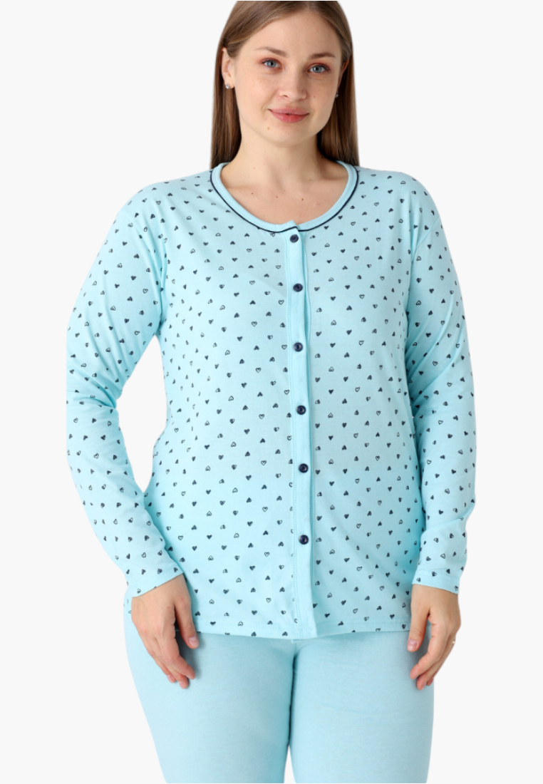Detail view of light blue cotton pajama set featuring small black heart print and button front.
