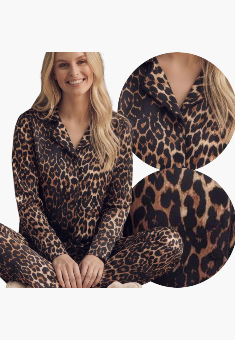Lifestyle shot of leopard print pajamas with long sleeves on a white background.