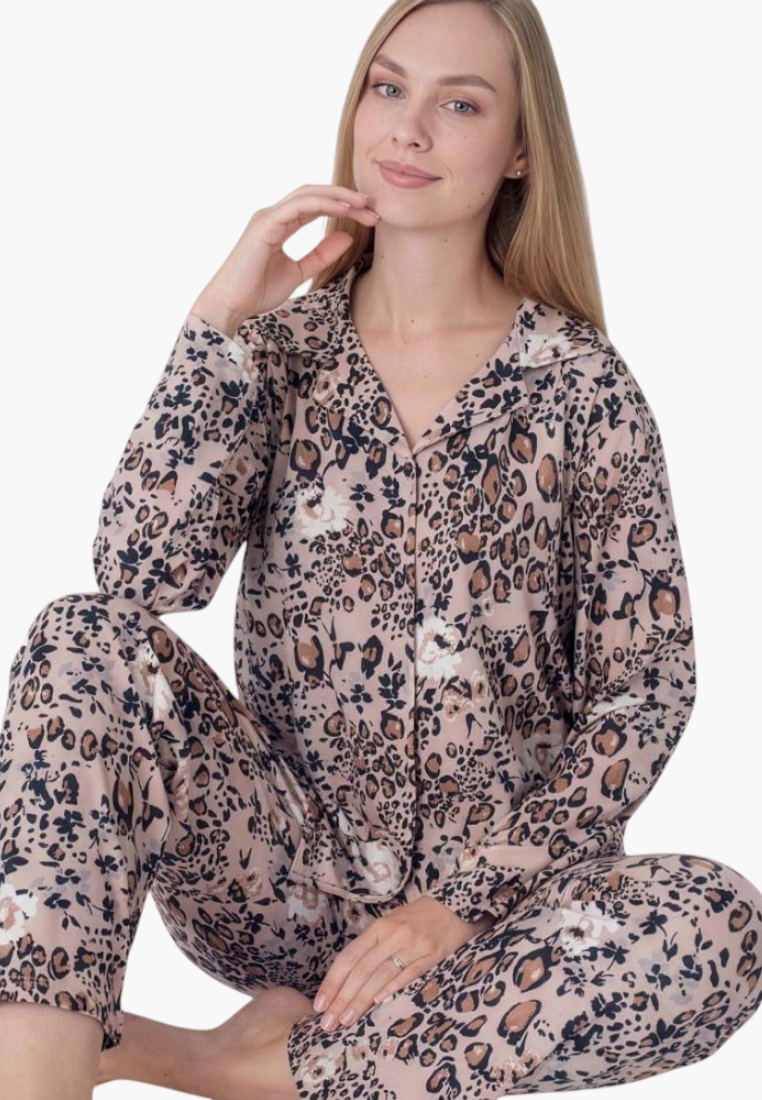 Close-up detail of a floral pajama set featuring button closure and long sleeves.