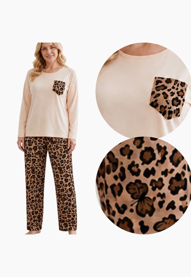 Lifestyle shot of beige and brown leopard print pajamas with long sleeves.