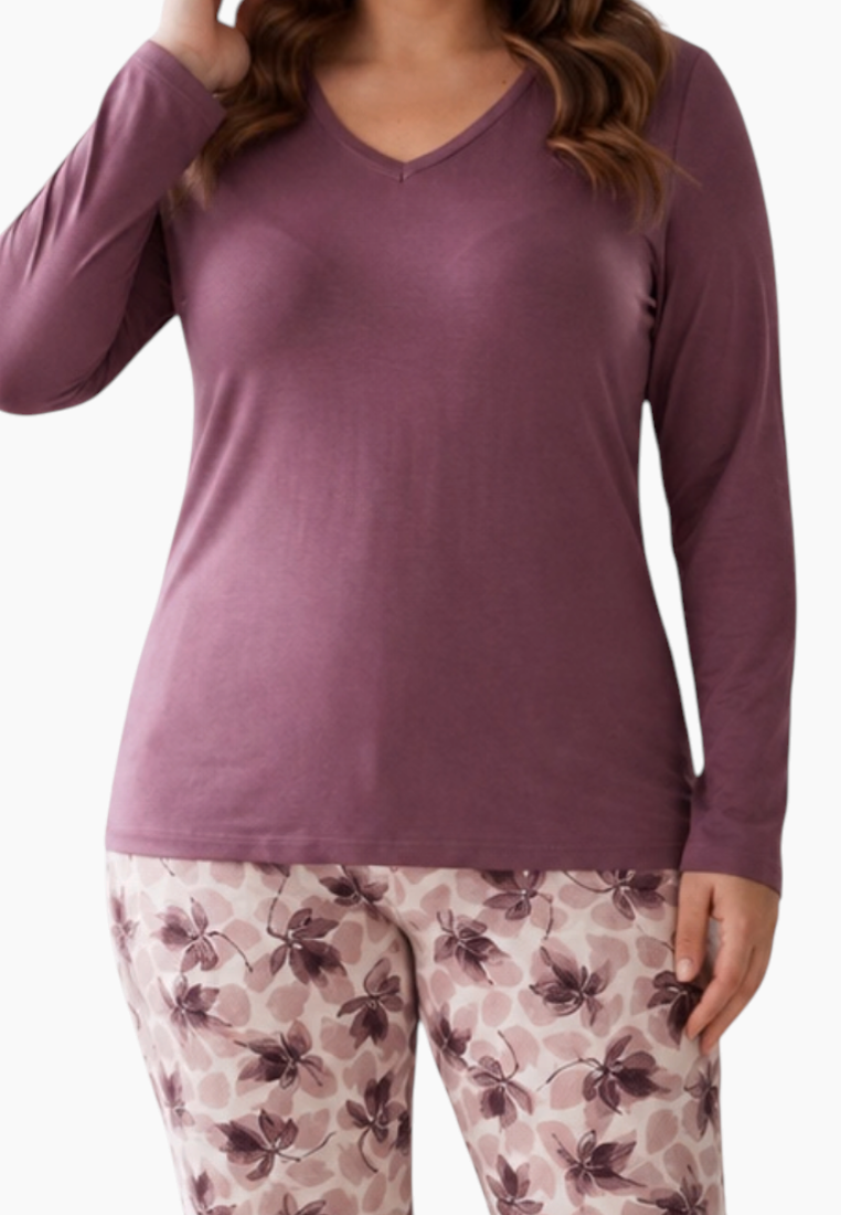 Back view of a purple pajama set with floral print pants.
