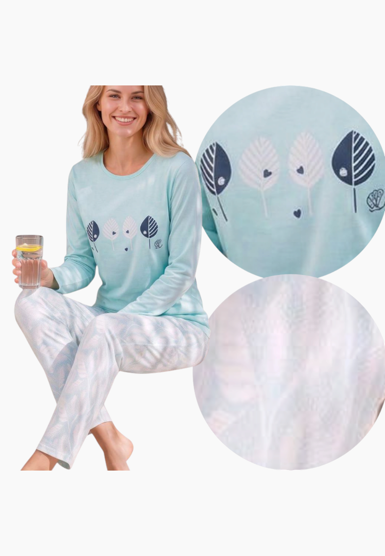 Detail view of light blue pajama top with graphic print and long sleeves.