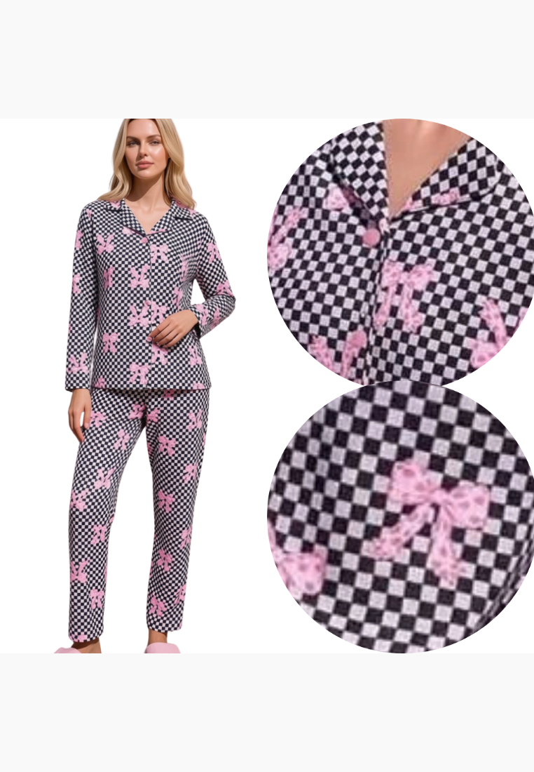 Lifestyle shot of women's pajamas in gray, pink, and black with a checkered pattern and bow prints.