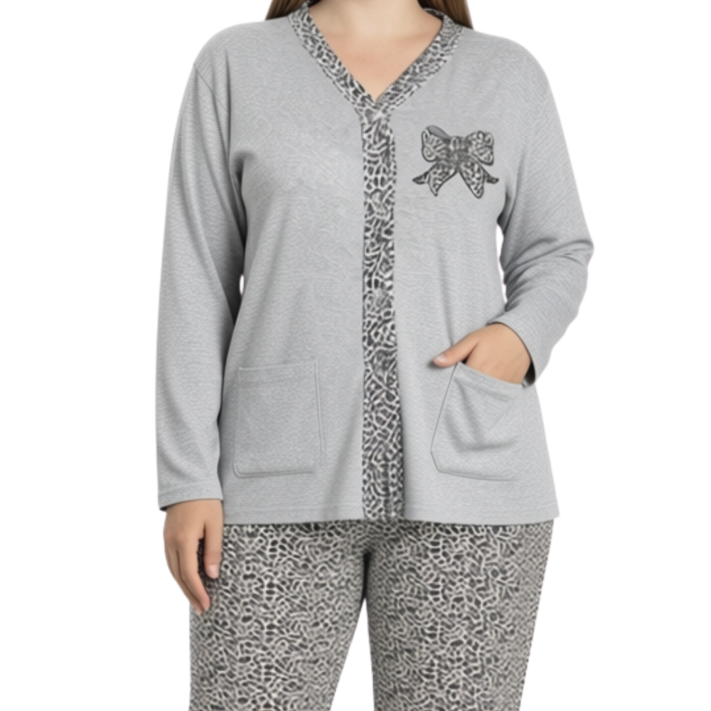 Lifestyle shot of a gray pajama set highlighting bow detail and button closure.