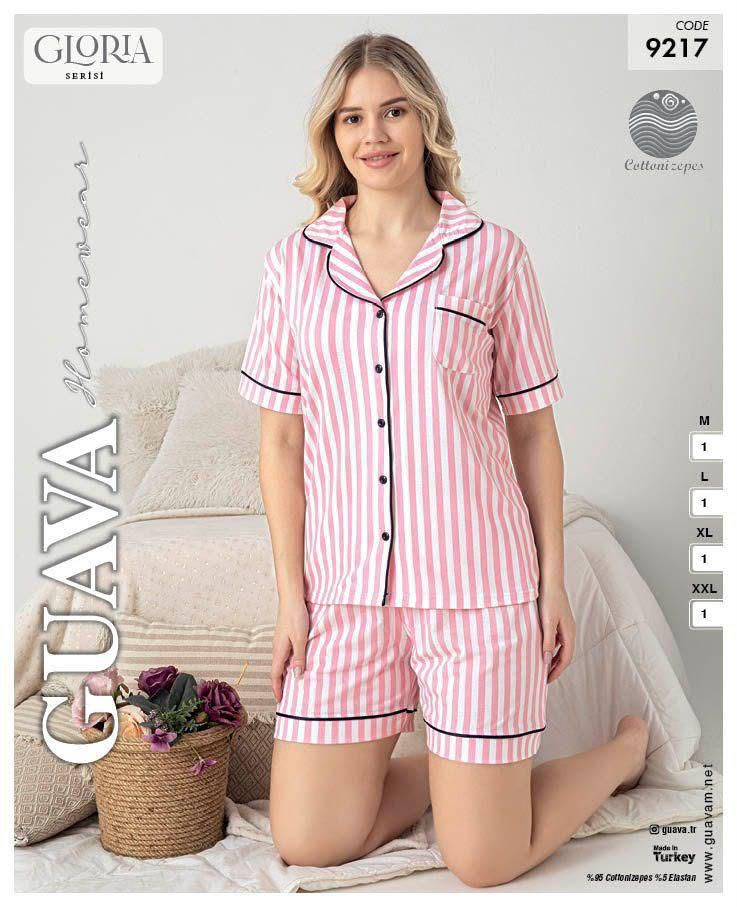 Lifestyle shot of pink striped pajamas featuring short sleeves and button closure.