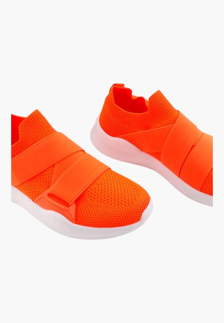 Front view of orange athletic shoes with elastic straps and lightweight sole.