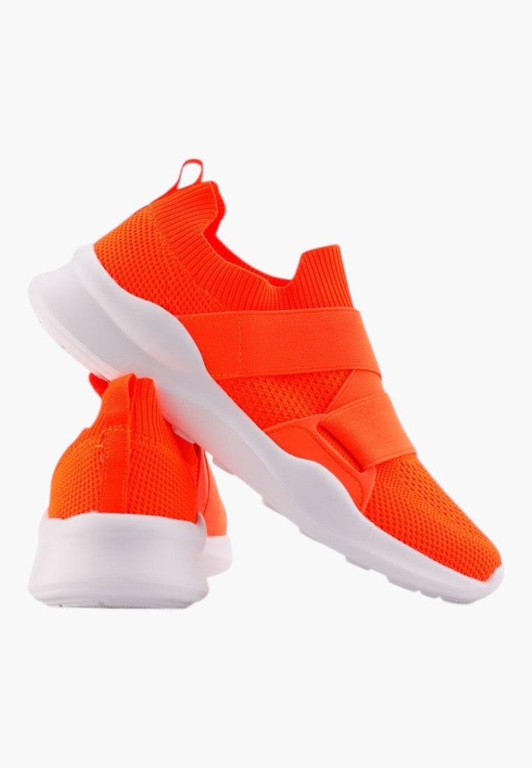 Side view of orange athletic shoes in orange and white with slip-on design.
