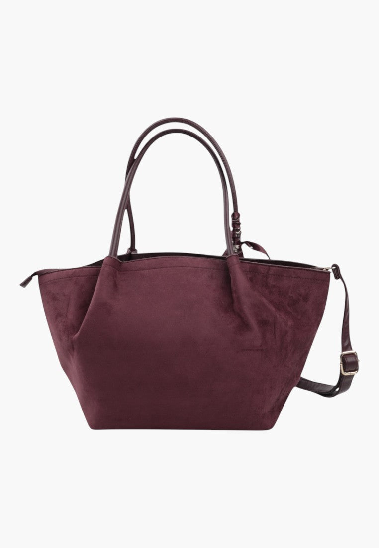 Back view of a large burgundy faux suede shopper bag featuring double handles.