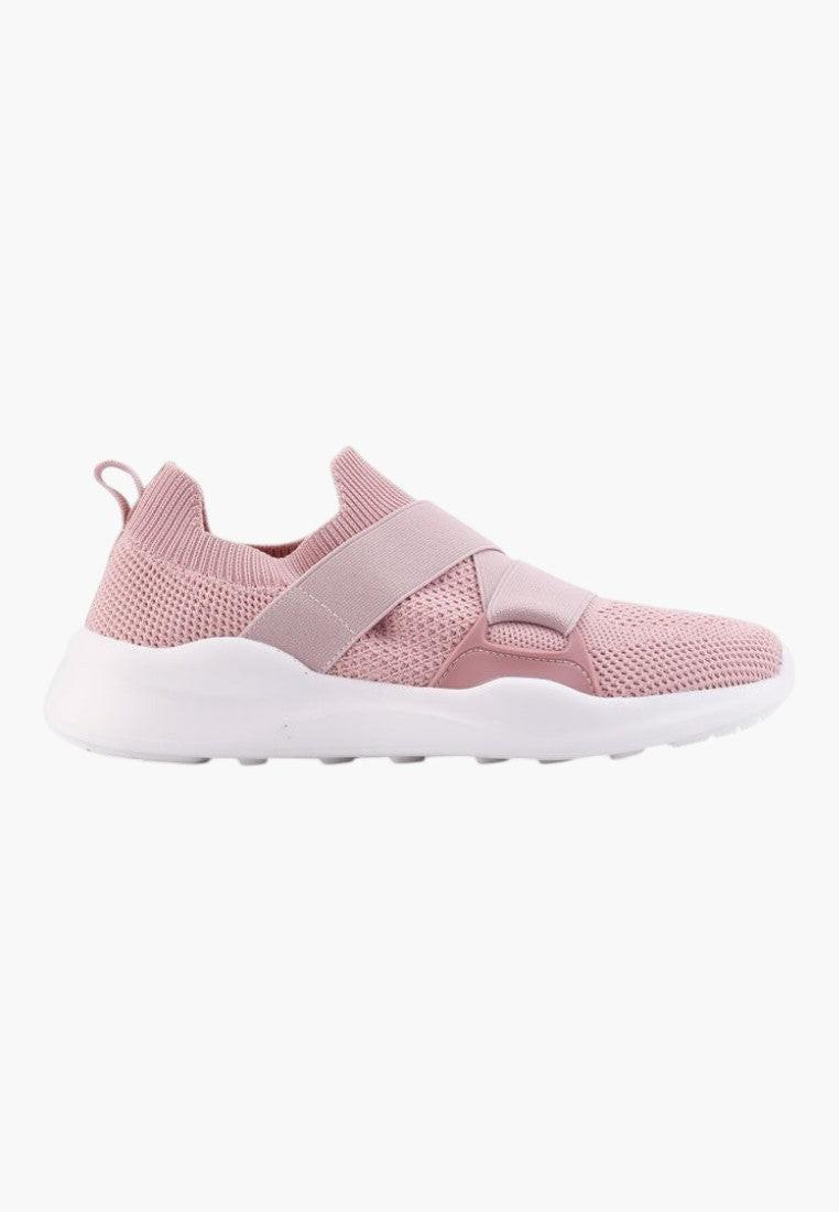 Styl życia z różowymi butami sportowymi damskimi, wsuwany design.