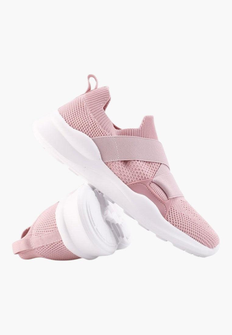 Różowe buty sportowe damskie, widok z boku, gruba podeszwa.