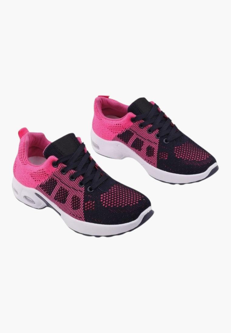 Różowe sneakersy damskie z siateczkowym wierzchem, widok z boku.