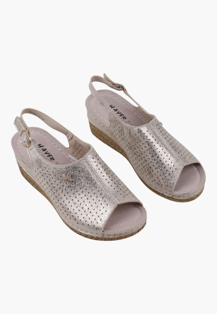 Front view of wedge sandals in silver and beige featuring open toe and slingback strap.