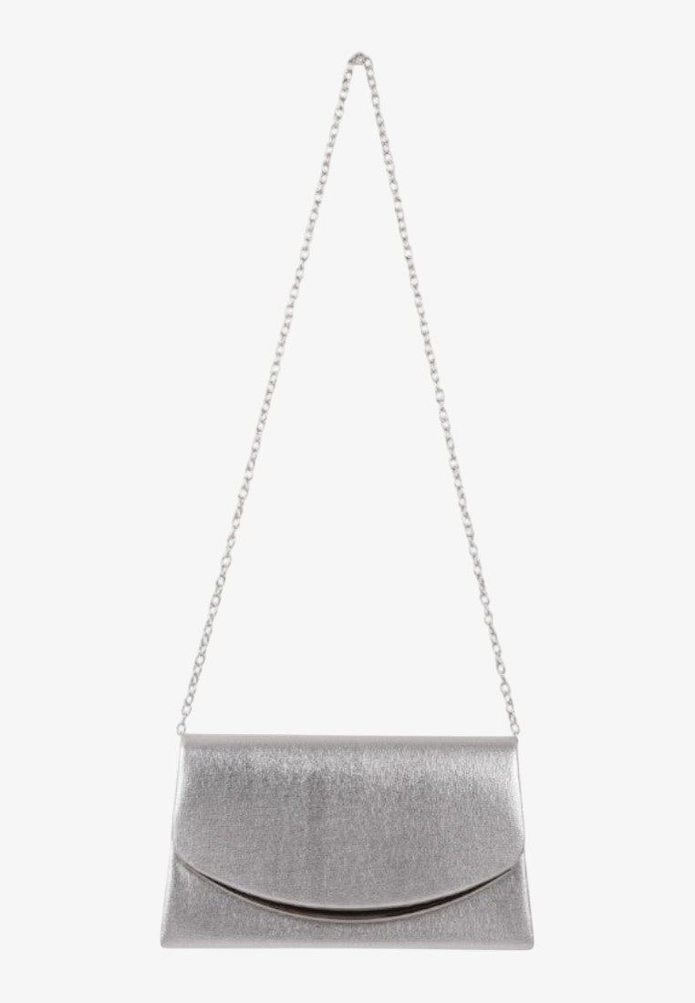 Lifestyle shot of a silver clutch bag showcasing its stylish design with a chain strap.