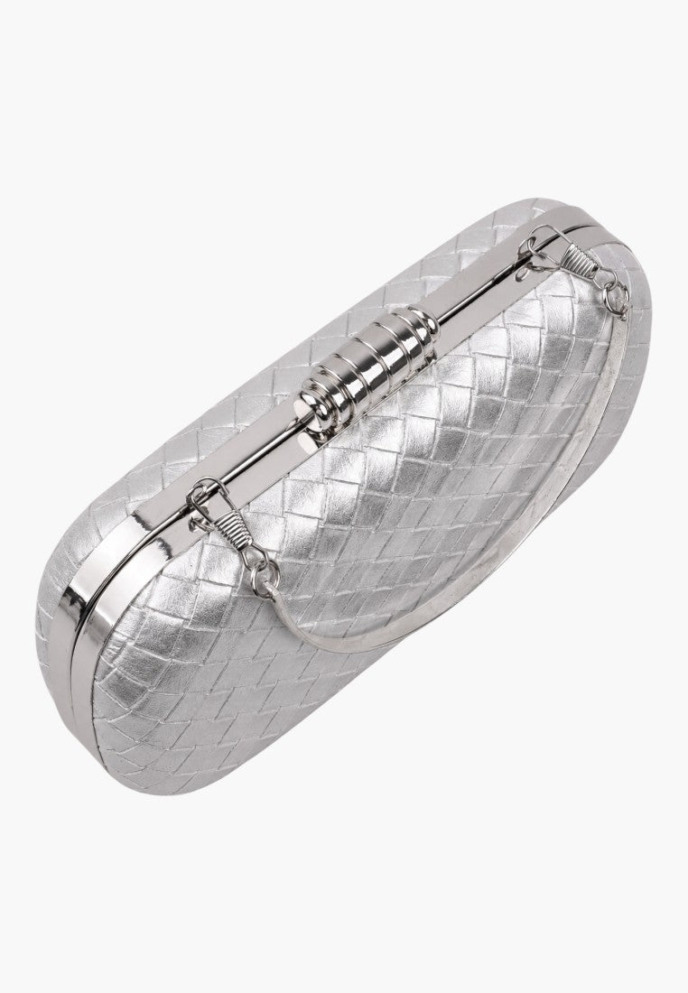 Side view of a silver clutch bag featuring a rounded shape and zipper closure