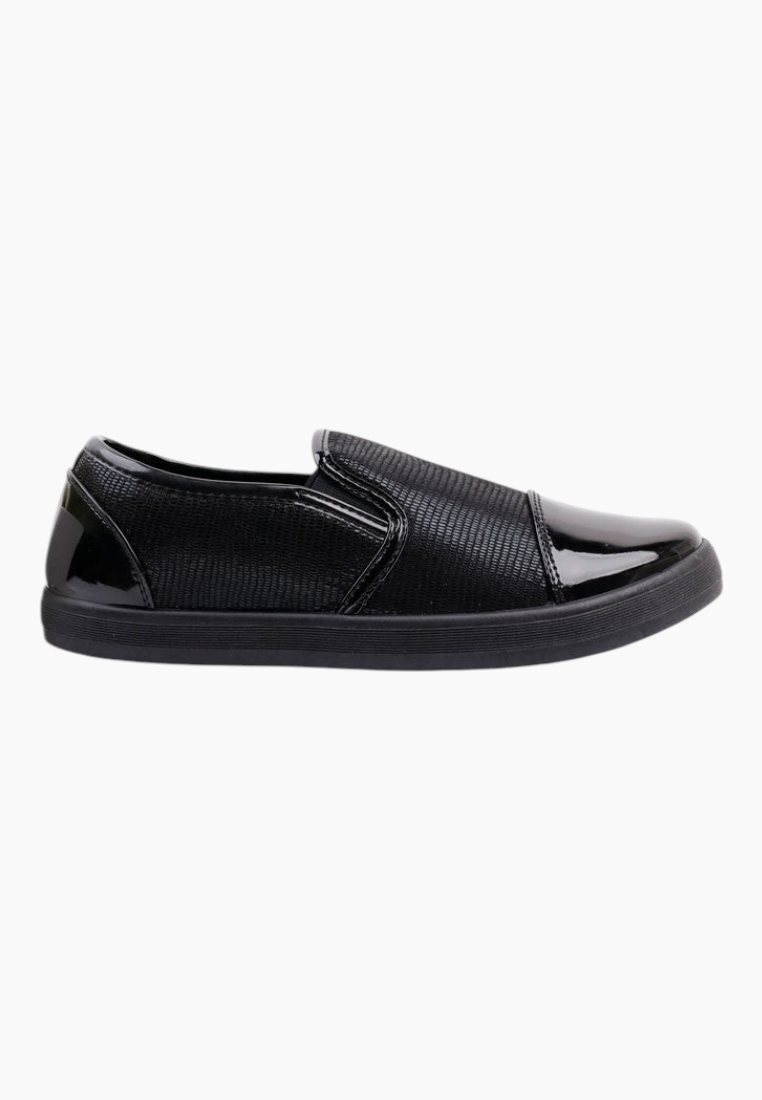 Side view of black slip-on shoes featuring a sleek design without laces.