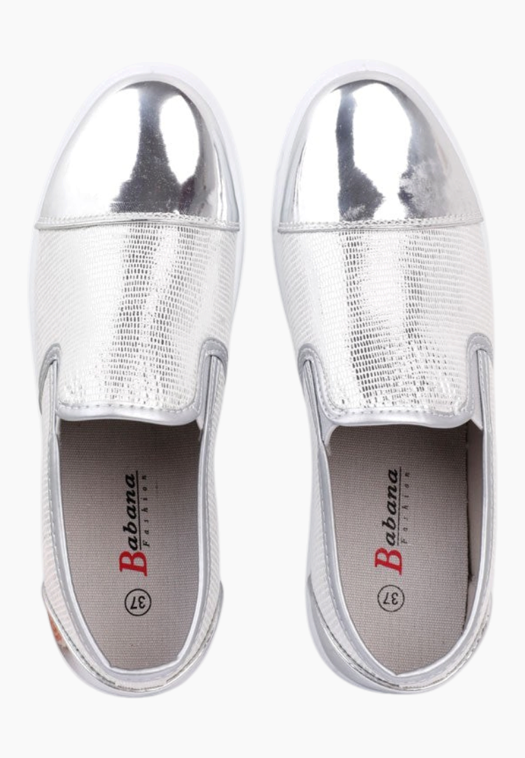 Top view of comfortable silver slip-on shoes with metallic finish.