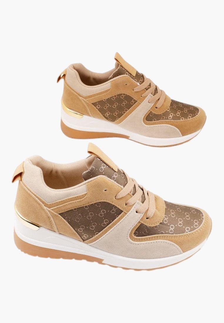 Side view of sneakers showing mesh panels and lace-up closure.