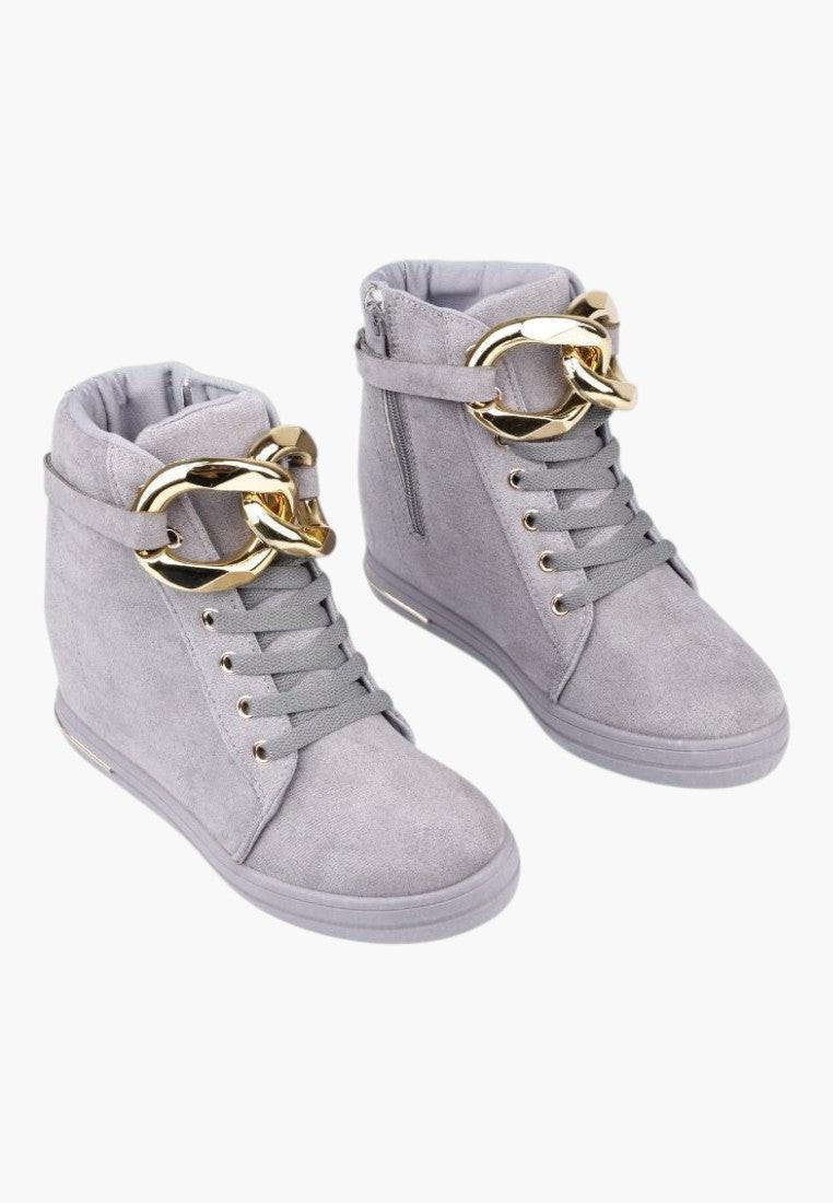 Widok z przodu szarych sneakersów damskich z ukrytym koturnem.