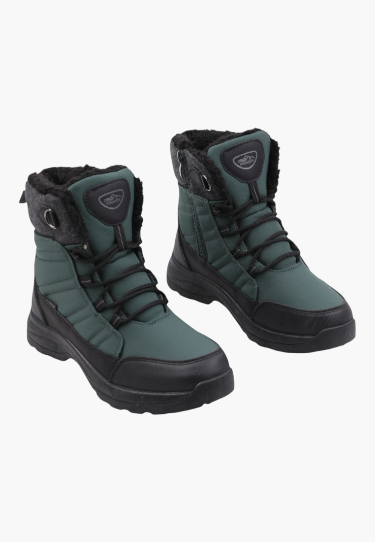 Detail close-up of green winter boots with textured fabric and reinforced toe.