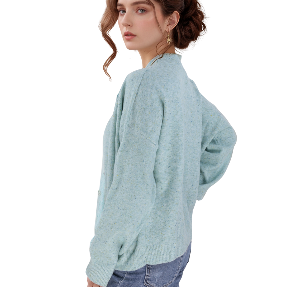 Back view of the light blue sweater showcasing long sleeves and crew neck.