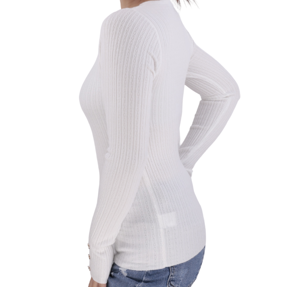 Side view of the white long-sleeve top highlighting the V-neck and button details.