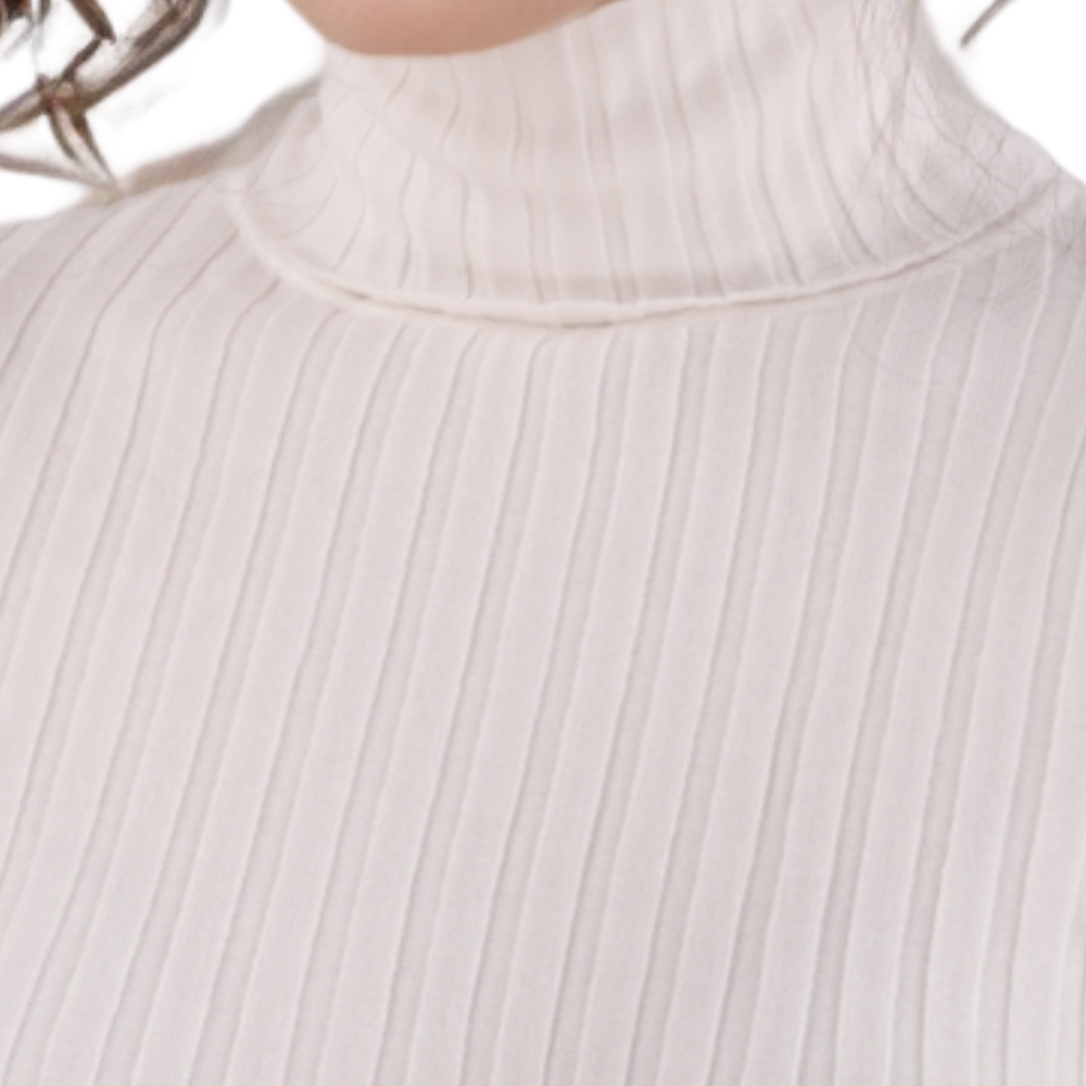 Detail close-up of the ribbed texture on the white turtleneck sweater.